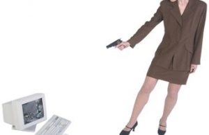 Image Of Woman Turning A Gun On A PC