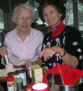 Elaine Pereira and her mother baking together