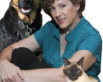 Amy Shojai with a dog and a cat