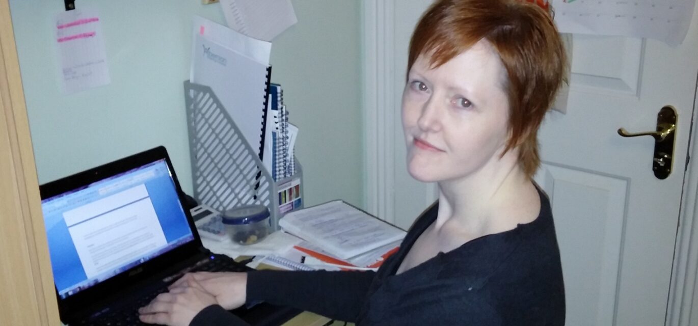 The author Eliza Green at her desk