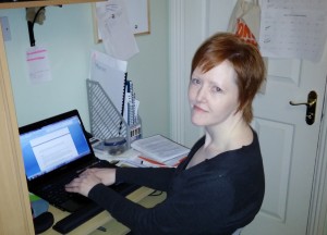 The author Eliza Green at her desk