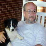 Photo of Giacomo and his dog