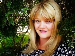 Terry Tyler head and shoulders out of doors