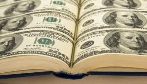 Financial management image - book of dollar bills