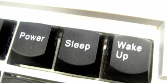 Computer keyboard with keys saying "power", "sleep" and "wake up"