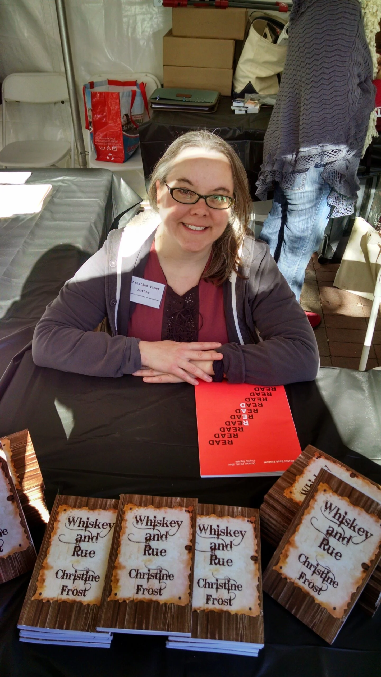 Photo Of Smiling Christine At Her Stall