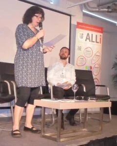 Photo of Debbie and Piers on stage