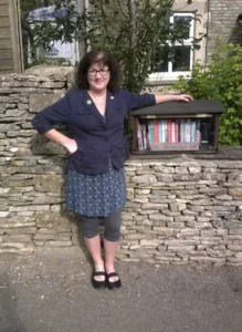 Debbie Young with her Little Free Library