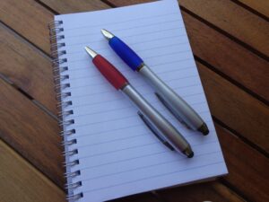Image of two pens lying side by side