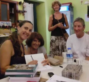 Atulya Bingham signing books for readers