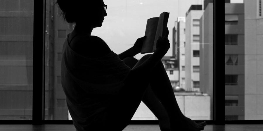 Girl Reading Alone