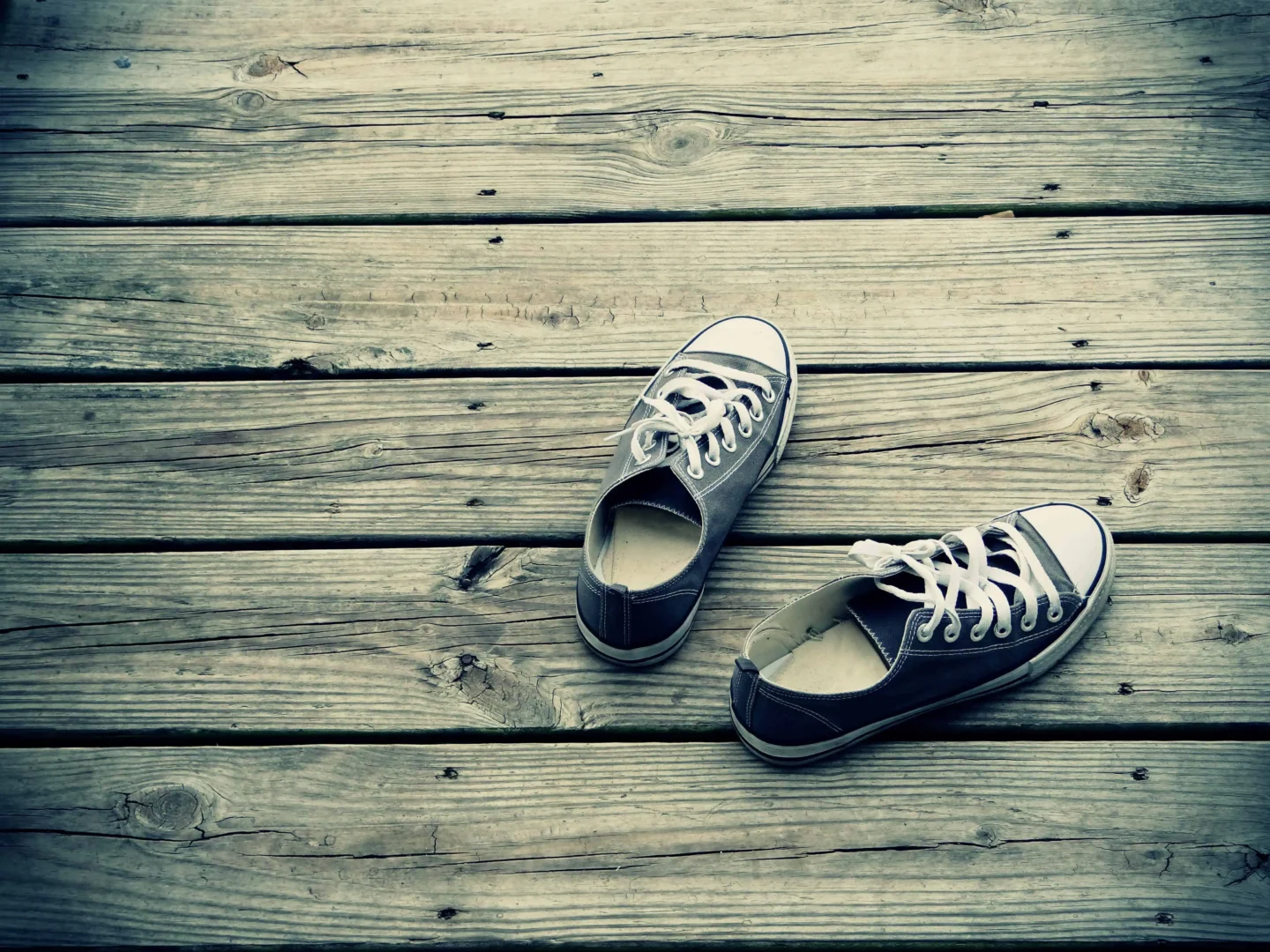 A Pair Of Shoes On A Wooden Floor