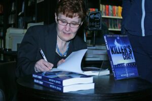 Photo of Wendy H Jones signing books