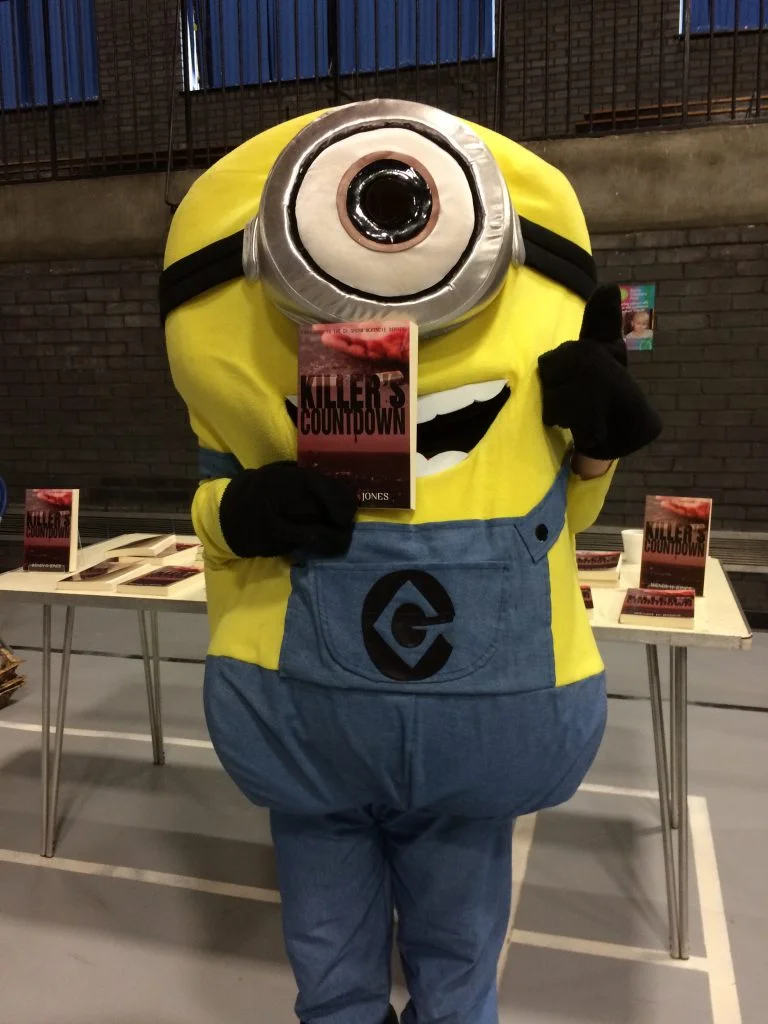 Minion holding Wendy H Jones novel