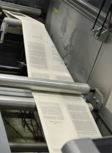 A run of books being printed