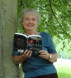 Chris Longmuir With One Of Her Novels