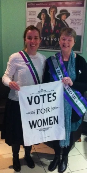 Photo Of Rebecca And Lucienne With Poster