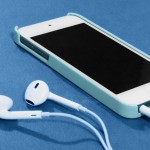 image of iphone and earbuds used to listen to abooks