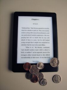 picture of ereader with coins