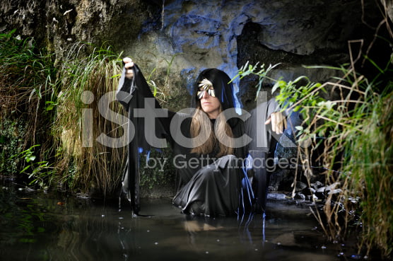 photo of a hag in a swamp outside a cave