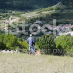 stock-photo-21623995-shepherd-and-flock-above-french-village