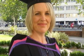 Head shot of Eden Sharp in academic gown