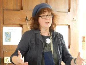 Debbie Young head and shoulders, wearing beret