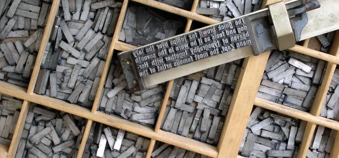 metal letters in printers tray