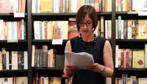 Photo of Jane Davis reading from her book