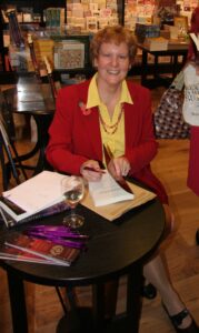 Photo of Alison at a book signing