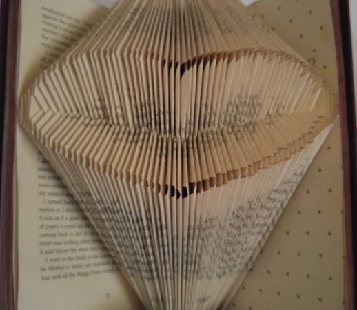 Photo Of Book Folded Into A Heart Shape