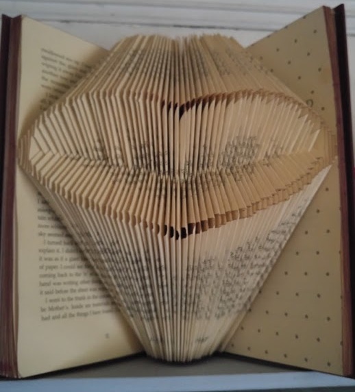 Photo of book folded into a heart shape