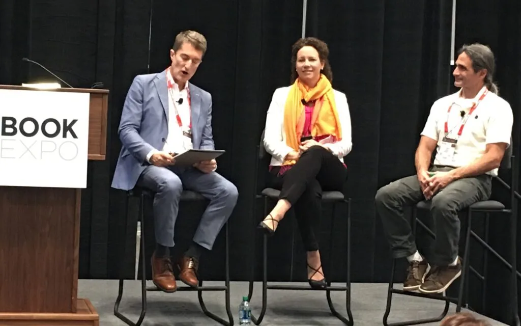 Photo of the three panellists in discussion