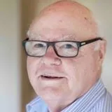 headshot of John Lynch