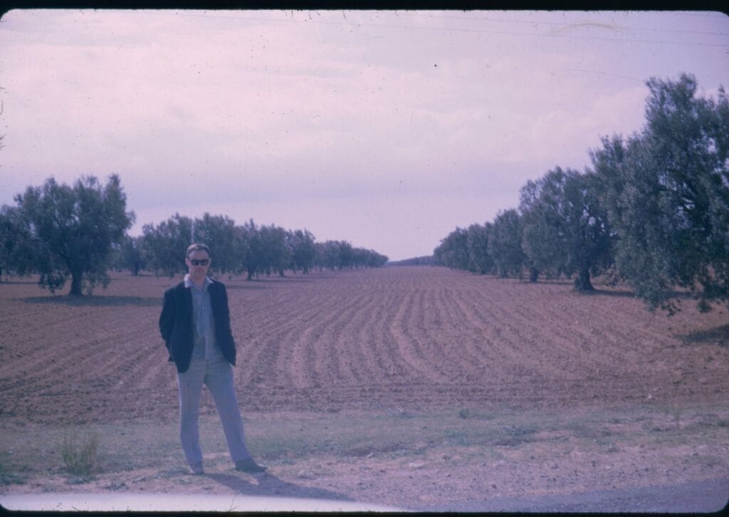 Photo of John in a field in North Africa