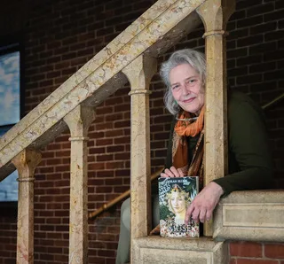 photo of Deborah on the stairs