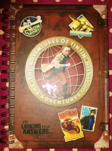 cover of TinTin noteboook showing travel destinations