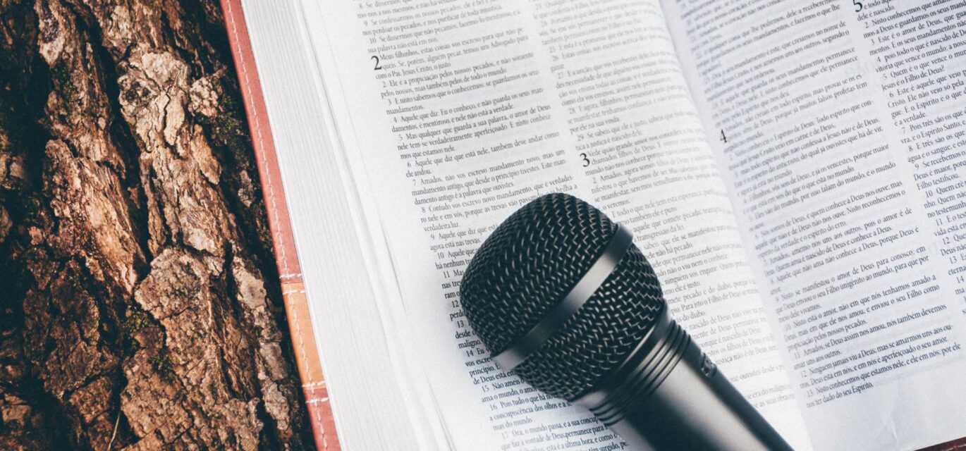photo of a microphone on a book