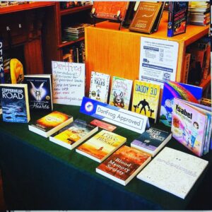 Tabletop display of DartFrog books