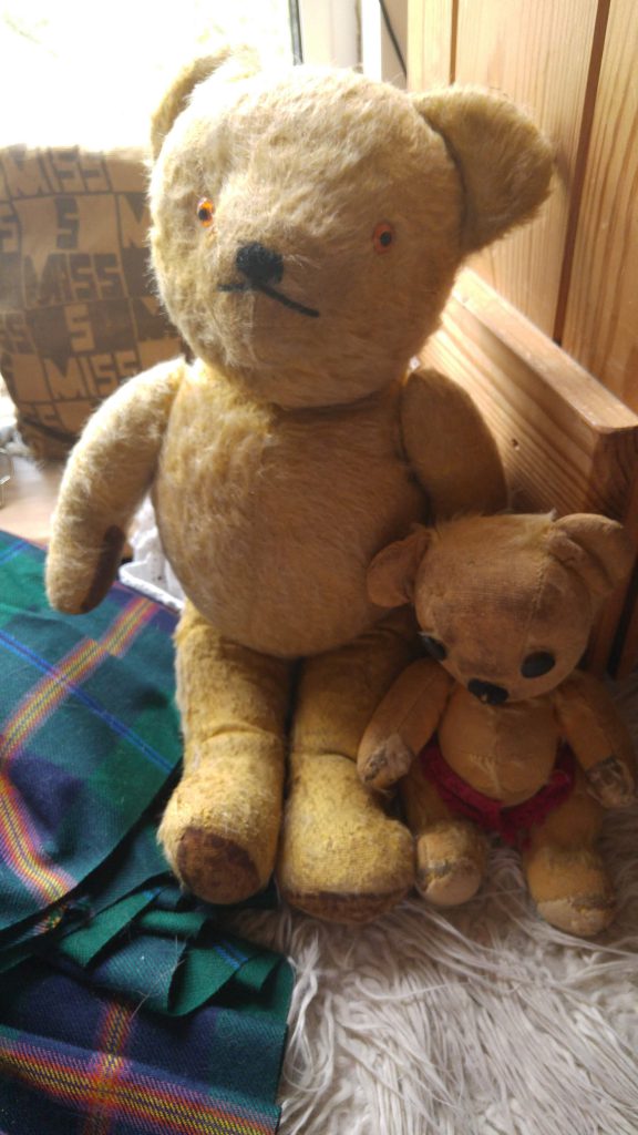 photo of two vintage teddy bears