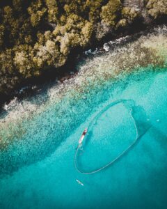 symbolic of going wide, image of fishing net in water by @joaopedrodesign via Unsplash.com