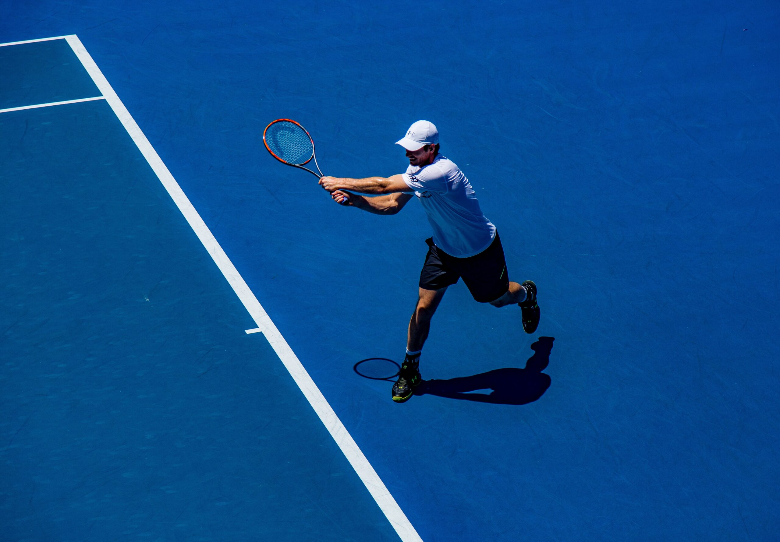Photo Of Tennis Player By Christopher Burns Via Unsplash.com