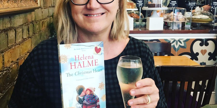 Photo Of Helena Halme With Wine And Book