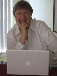 photo of Jane Steen at her laptop