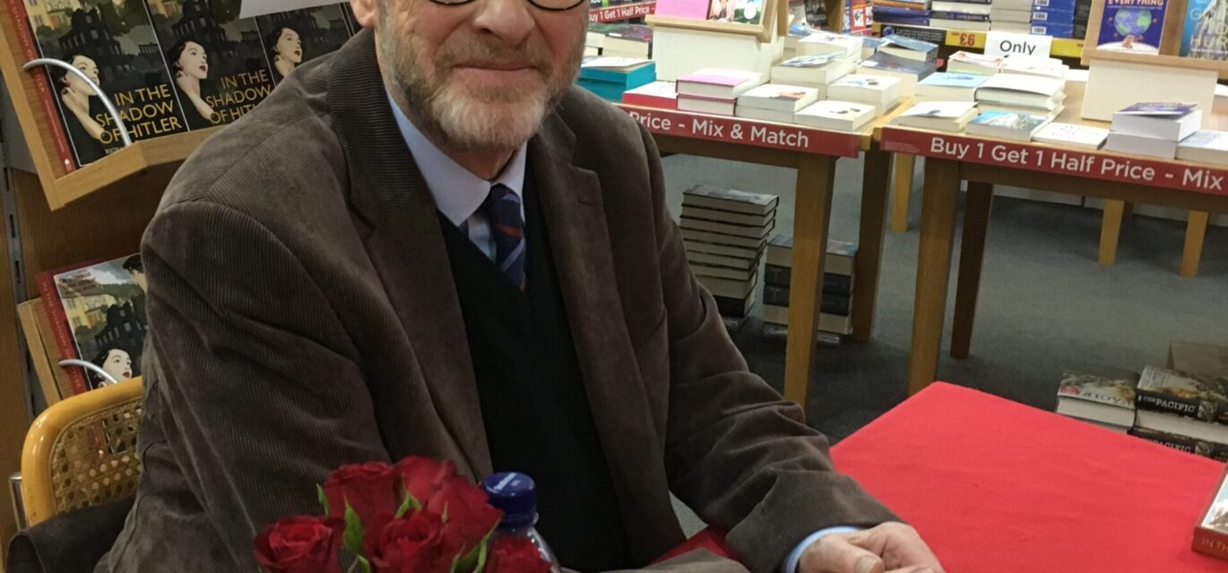 Richard Vaughan-Davies at his smartly presented signing table