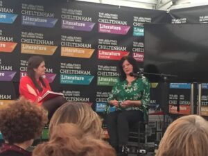 picture of Nicola Kelsall on stage at the Cheltenham Literature Festival