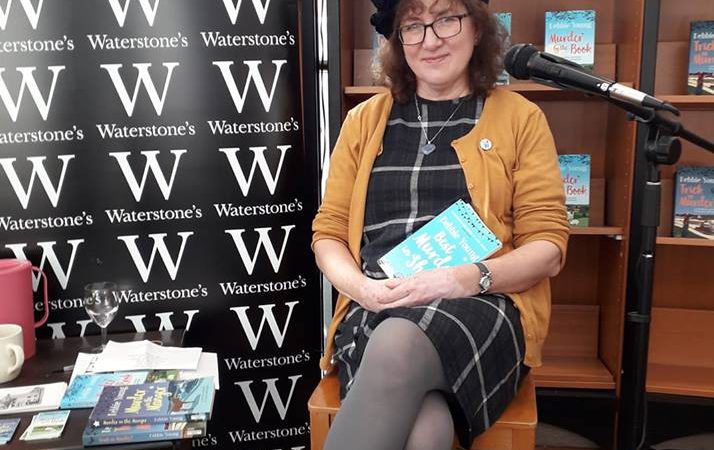 Debbie Young With Her Books In Bookstore With Waterstones Brand Clearly Visible